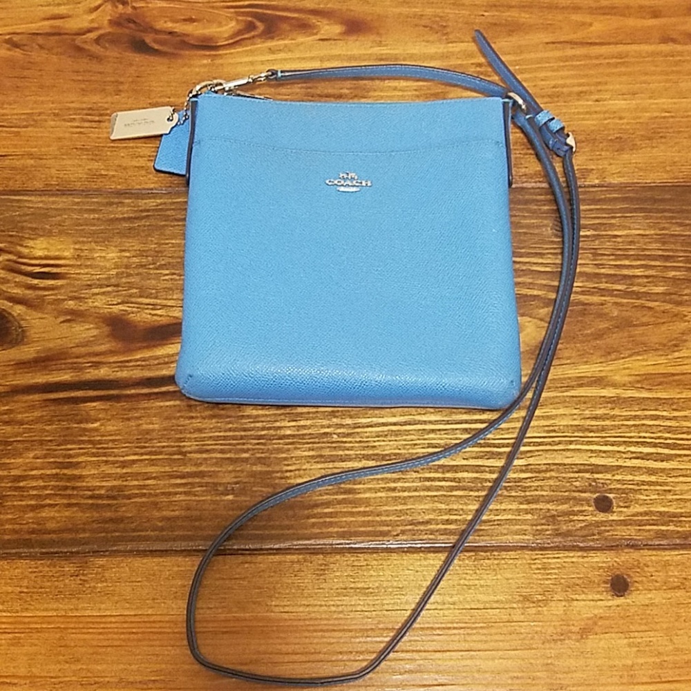 A blue Coach purse (satchel)